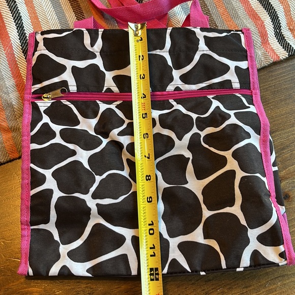 Zebra print bag. Black with pink handle and trim. Used several times. - Picture 4 of 7